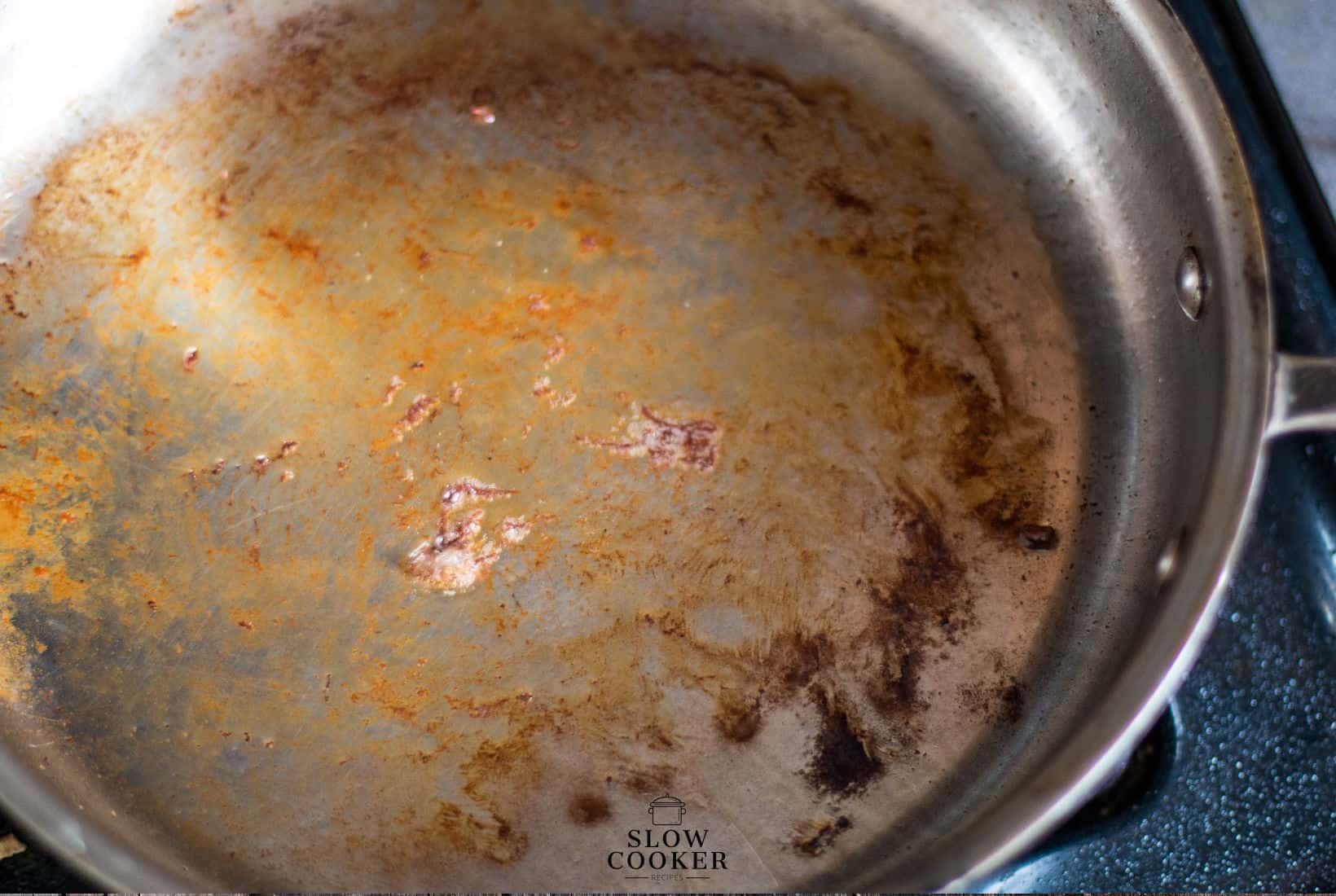 pan ready to be deglazed after searing beef.