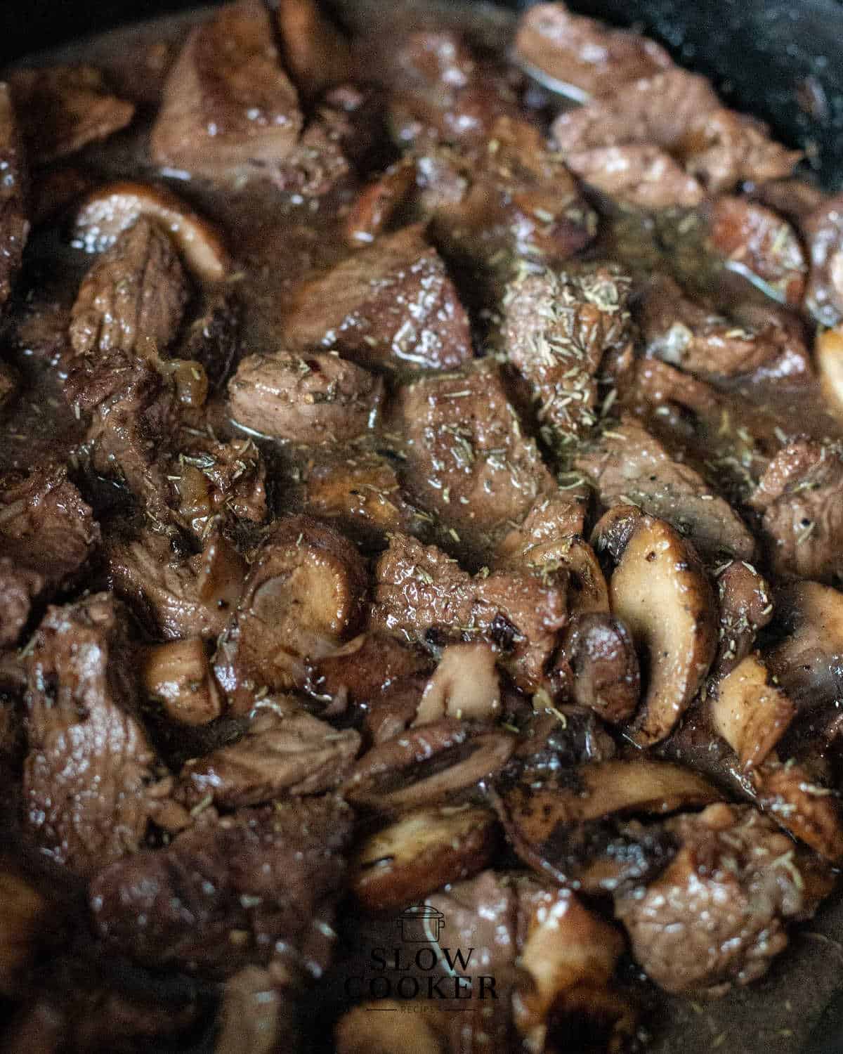 slow cooker beef stroganoff ingredients in the slow cooker.