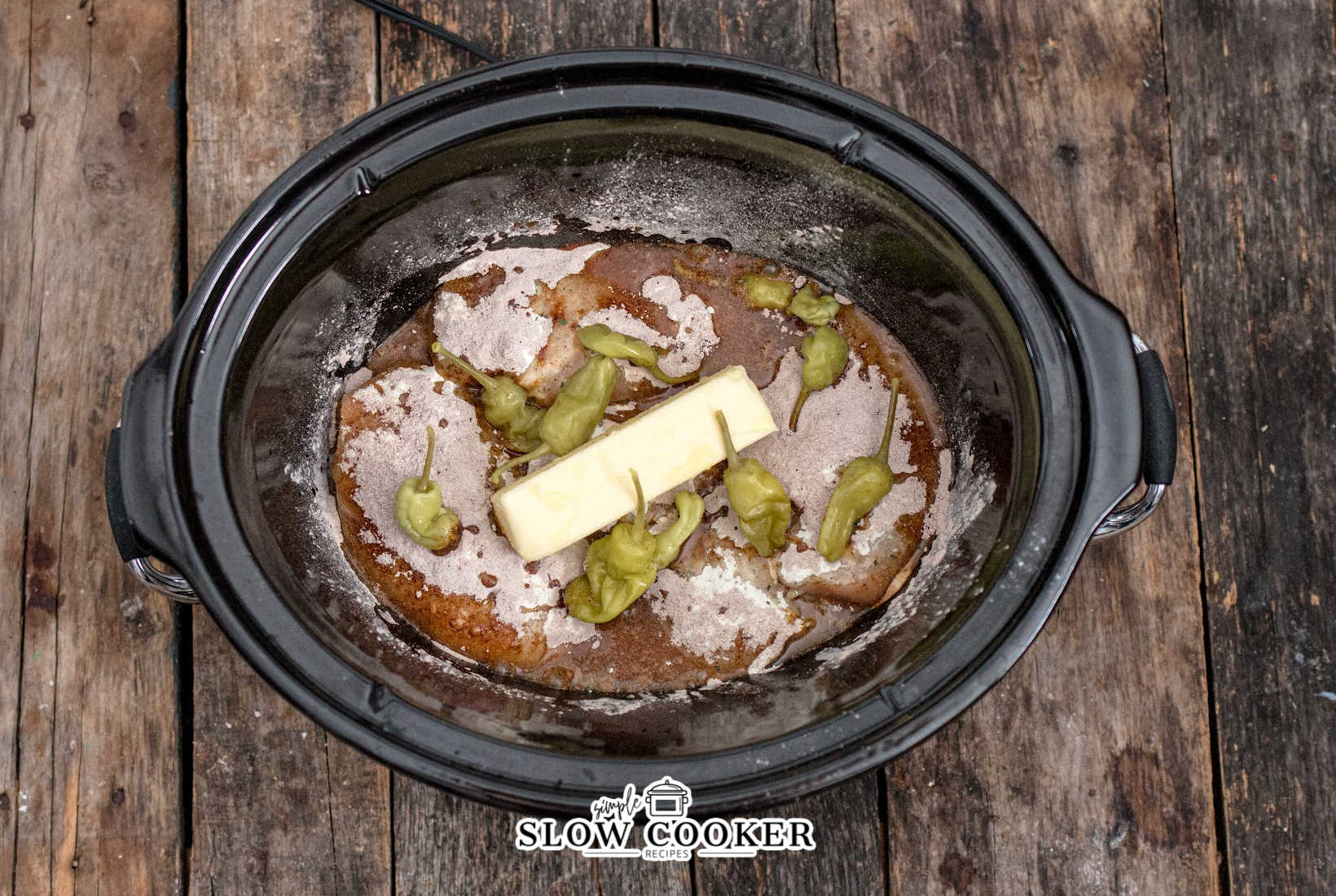 pepperoncini added to the slow cooker.